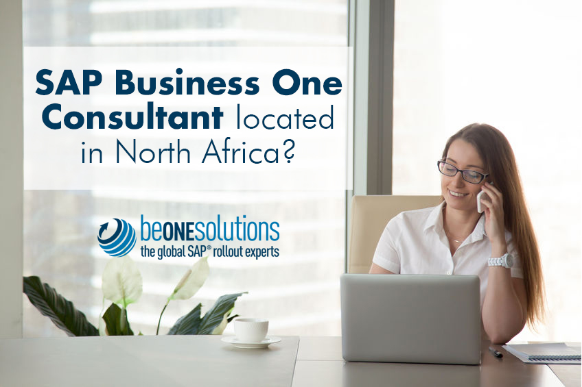 Beautiful young blonde girl in white blouse and black skirt is working in the office. photo with depth of field Be one solutions SAP Business One Consultant in North Africa