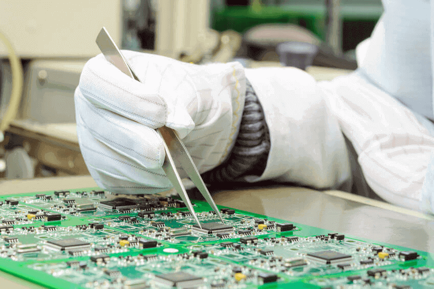 Quality control ABLIC Quality control and assembly of SMT printed components on circuit board in QC lab of PCB manufacturing high-tech factory