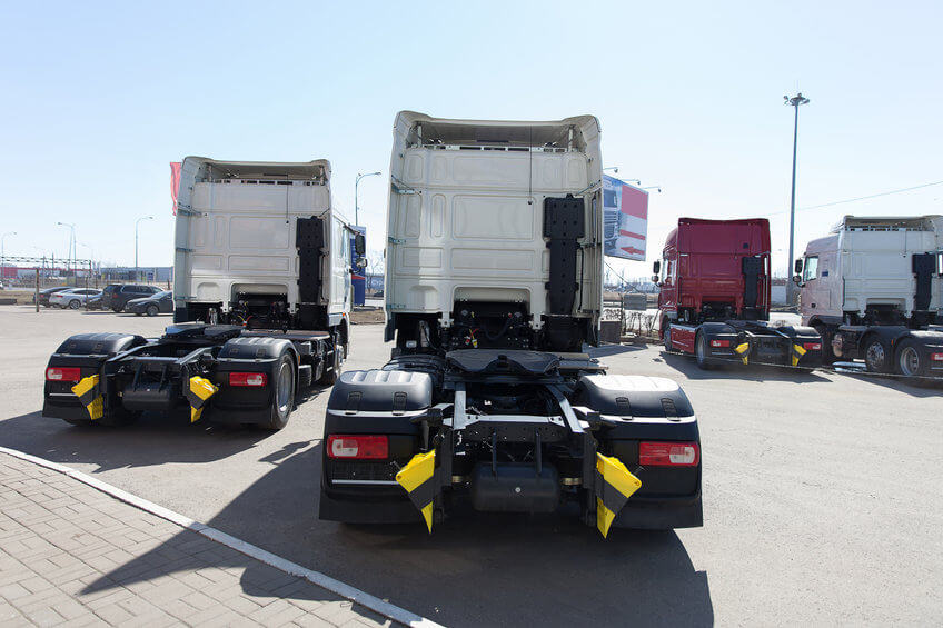 White trucks line up