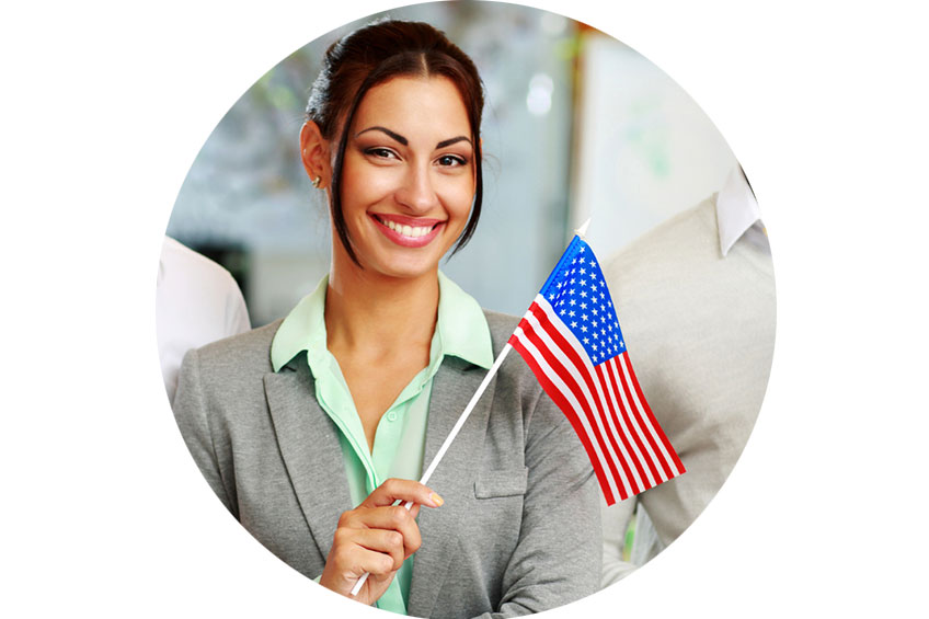 Woman smiling and holding a usa flag